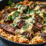 Skillet Steak and Rice with Melted Cheese: A Flavorful One-Pan Meal Skillet Steak and Rice with Melted Cheese: A Flavorful One-Pan Meal